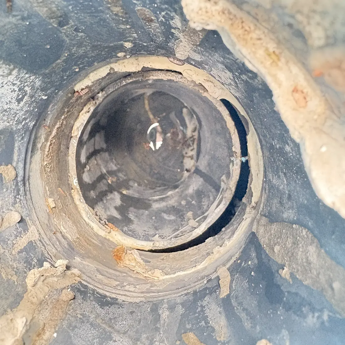 Damaged interior of a pipe before rehabilitation